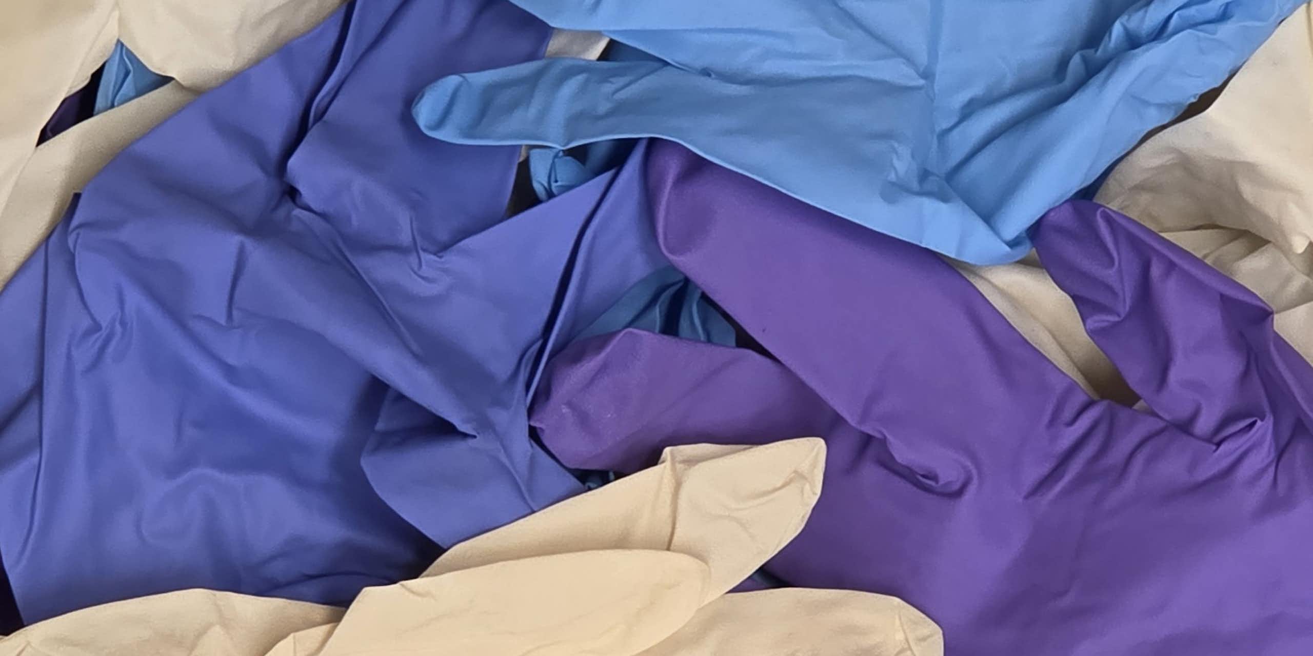 Image of overlapping laboratory gloves.