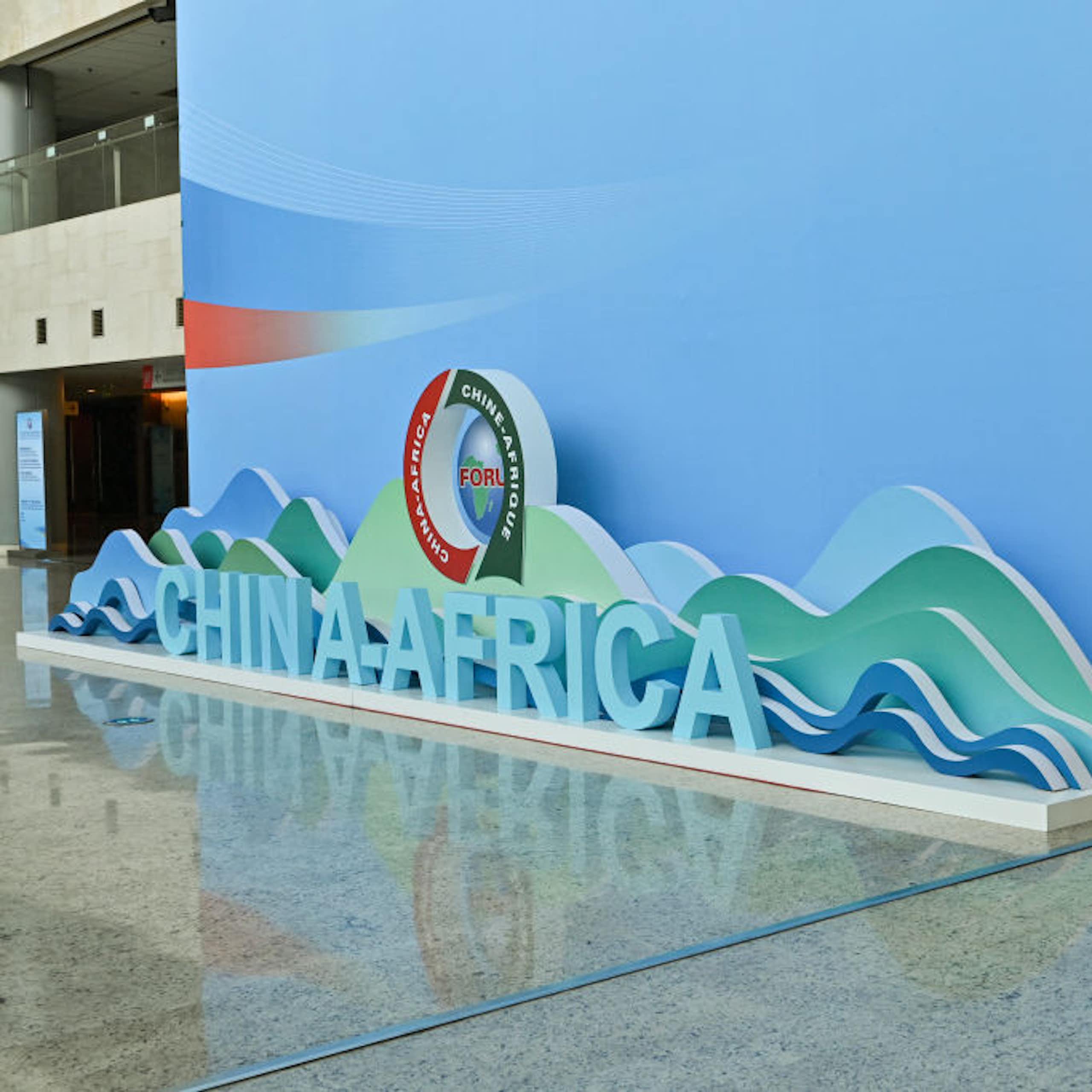 Logo saying China-Africa against the wall of a building