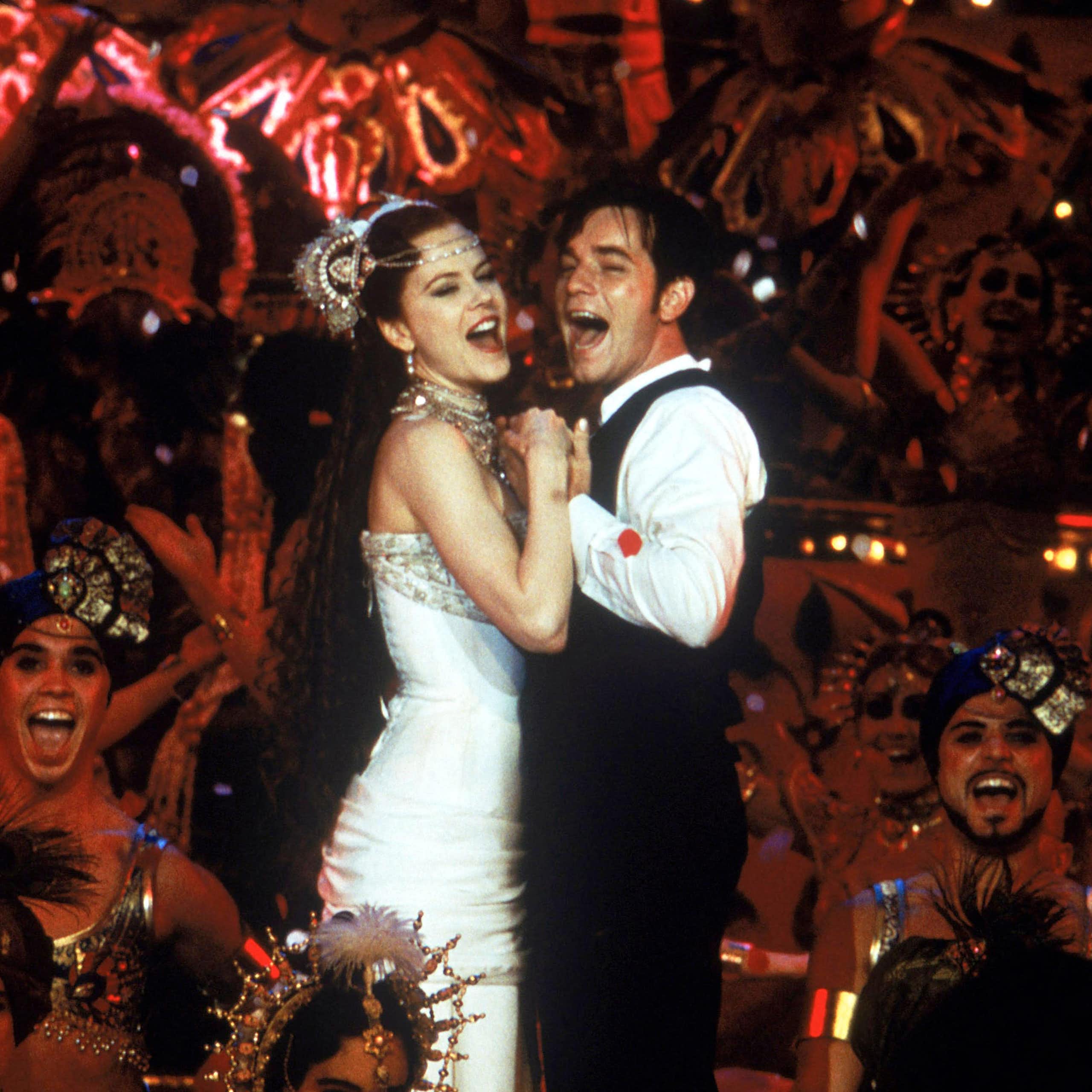 Nicole Kidman and Ewan McGregor holding hands